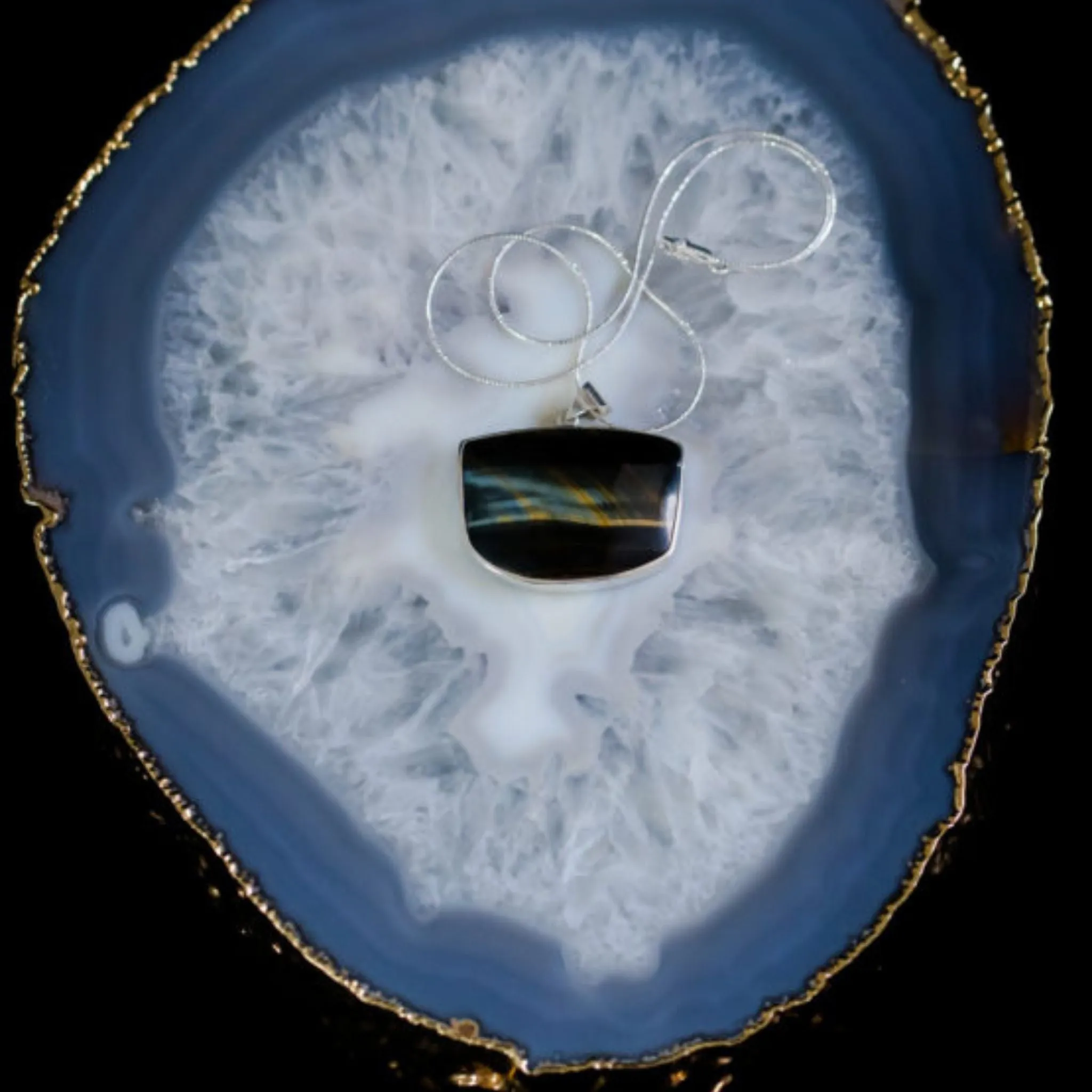 Blue Tiger's Eye ~ Hawk Eye ~ Falcon Eye Silky in appearance, the reflective surface changes with different lights