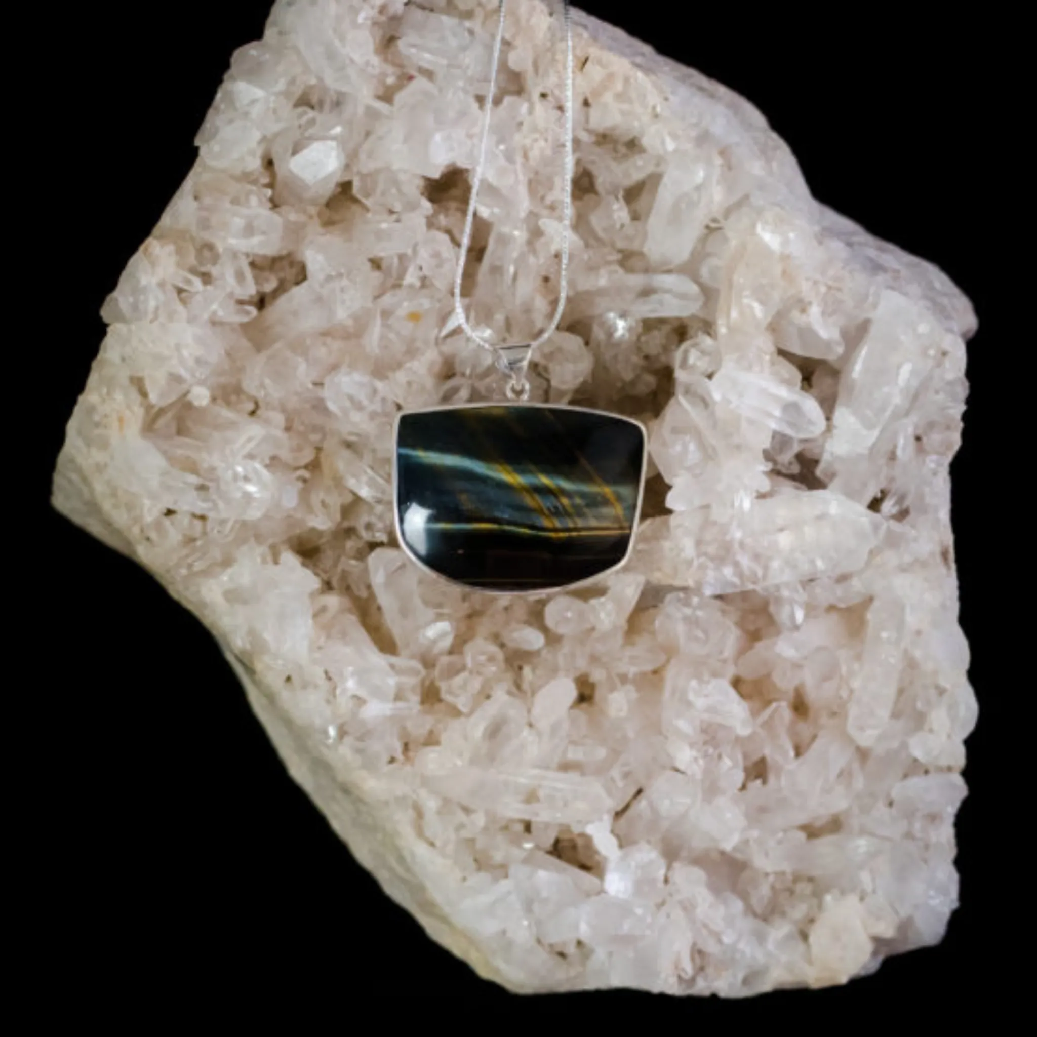 Blue Tiger's Eye ~ Hawk Eye ~ Falcon Eye Silky in appearance, the reflective surface changes with different lights