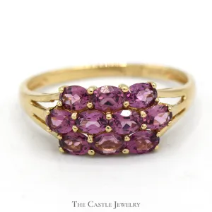 Oval Cut Rhodolite Garnet Cluster Ring in 14k Yellow Gold Split Shank Setting