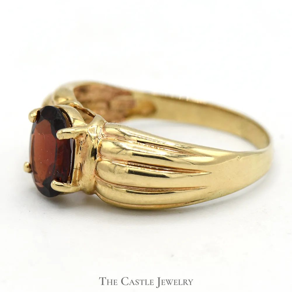 Oval Garnet Ring with Ridged Sides in 10k Yellow Gold