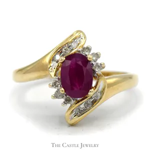 Oval Ruby Bypass Ring with Diamond Accent in 10k Yellow Gold