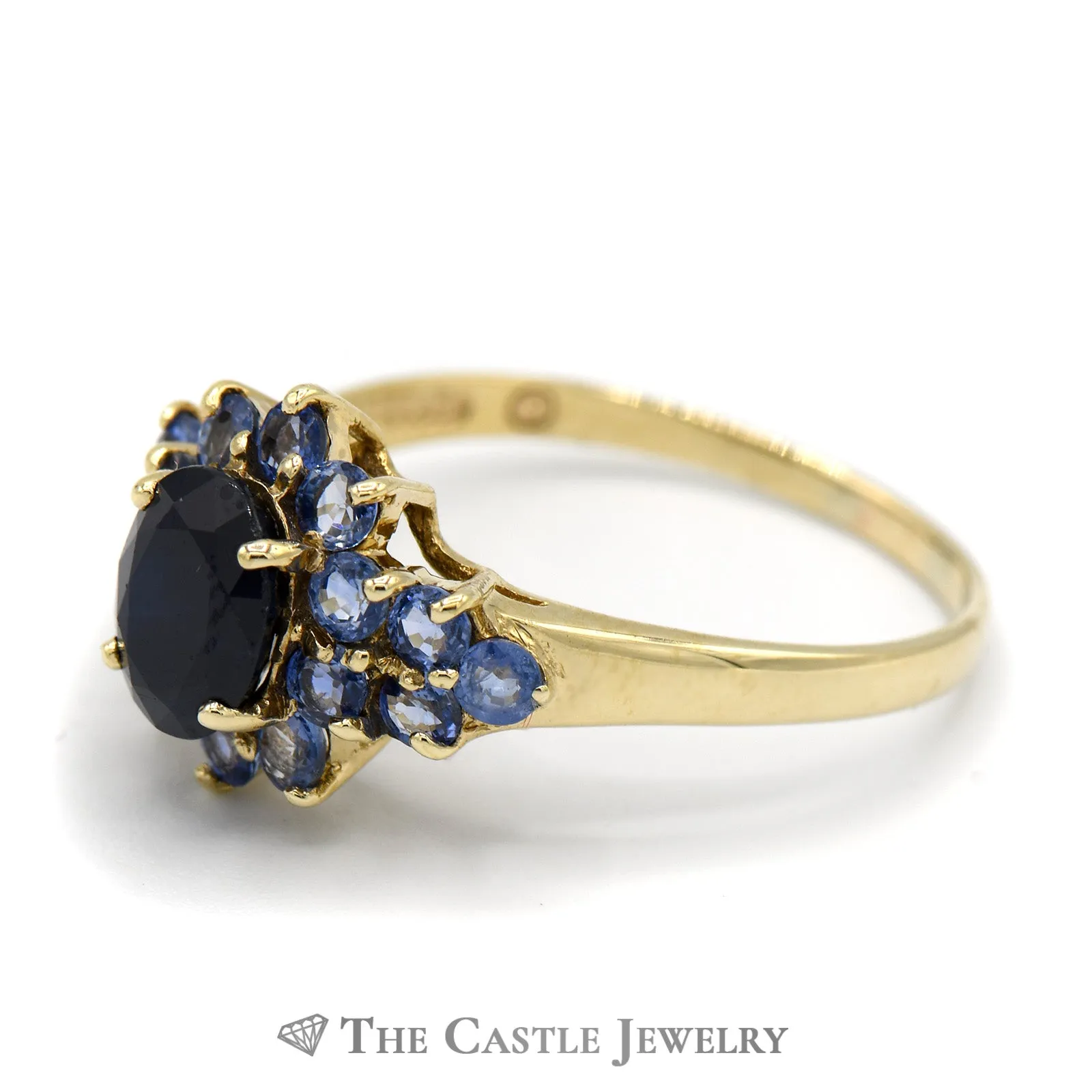 Oval Sapphire Ring with Tanzanite Cluster Sides in 10k Yellow Gold