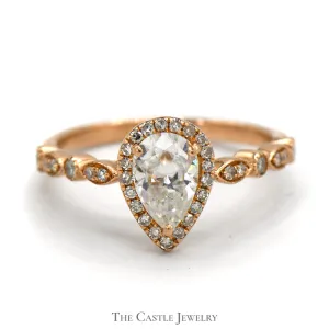 Pear Cut Moissanite Ring with Diamond Accents in 14k Rose Gold