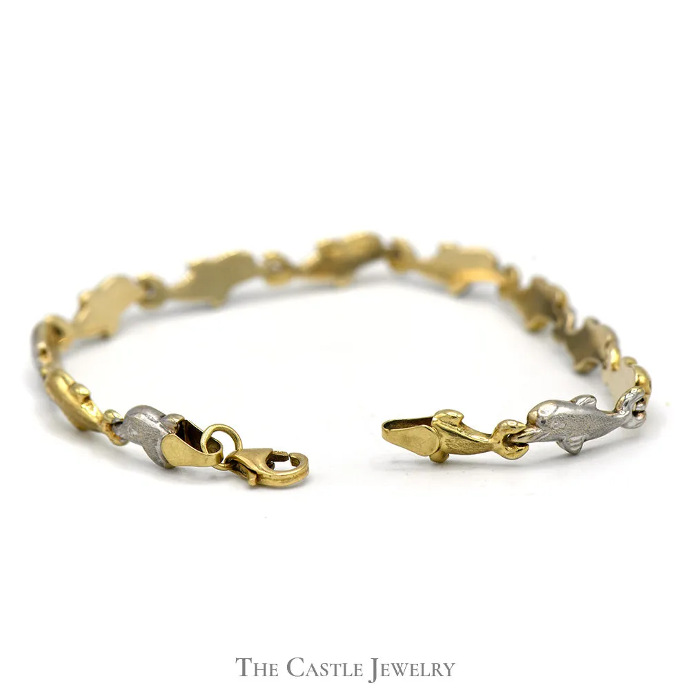Two Tone 7 Inch Dolphin Link Bracelet in 10k Yellow and White Gold