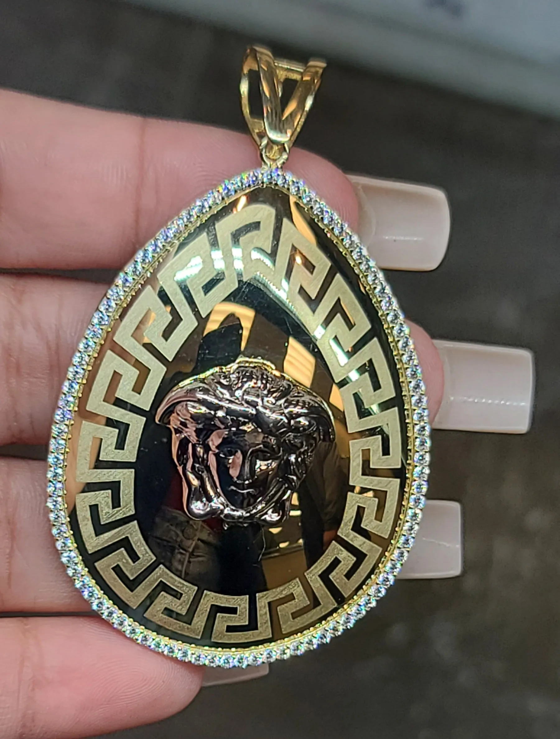 Yellow Gold Oval Pendant With Medusa Face and CZs