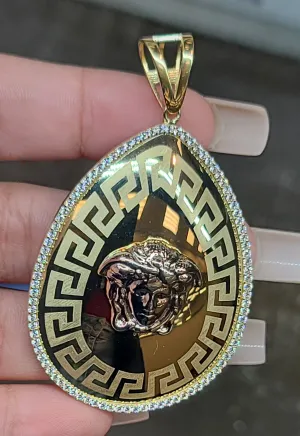 Yellow Gold Oval Pendant With Medusa Face and CZs